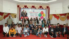 Students performing on stage – Indian Institute annual event