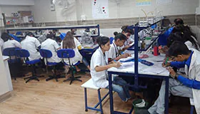 Students attending lab session – Indian Institute classroom